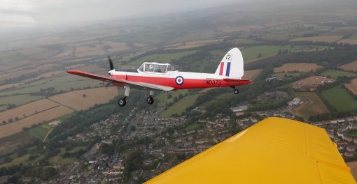 Photo of a Chipmunk midflight taken from another aircraft